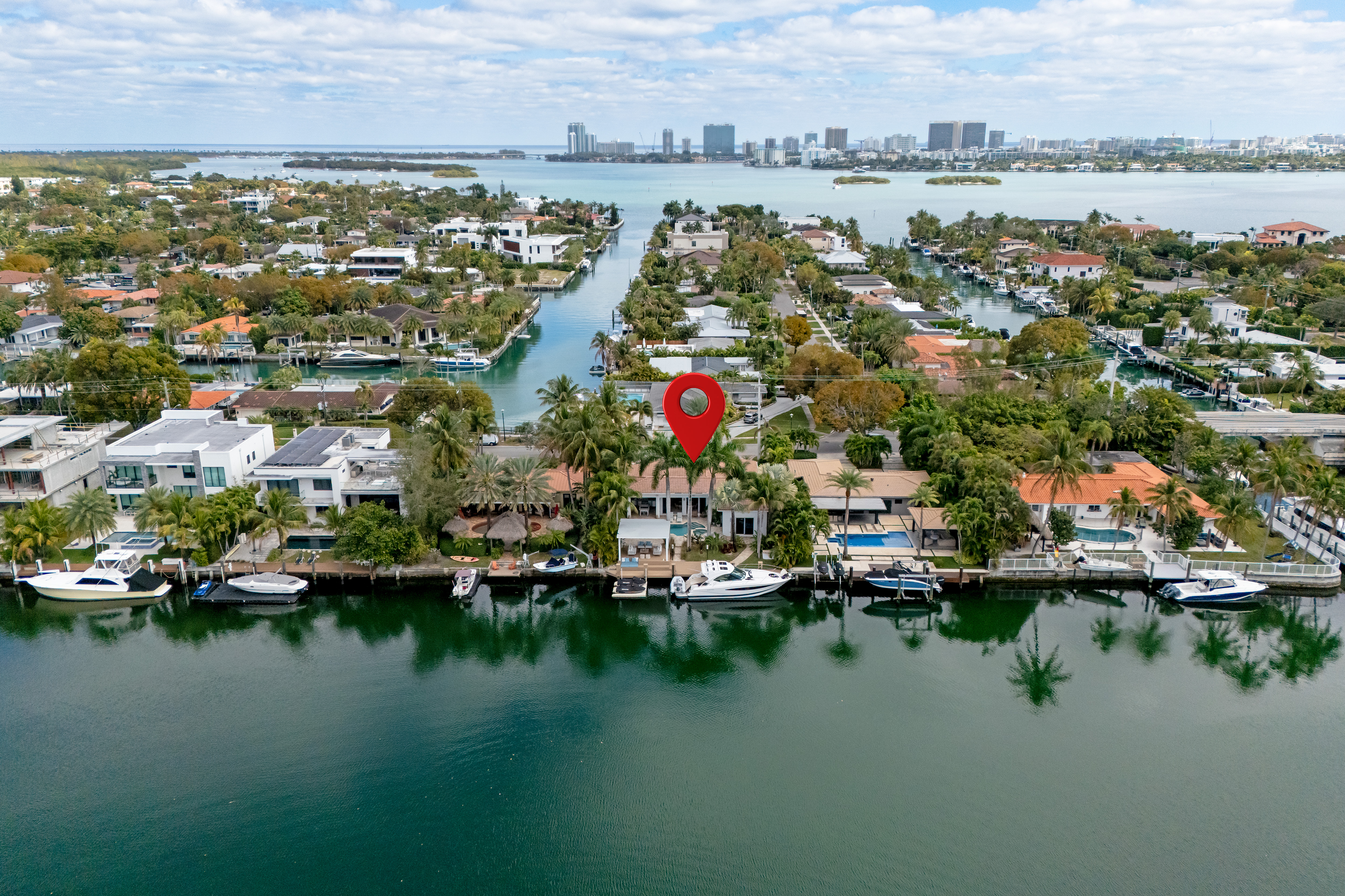 Aerial view of property and canal